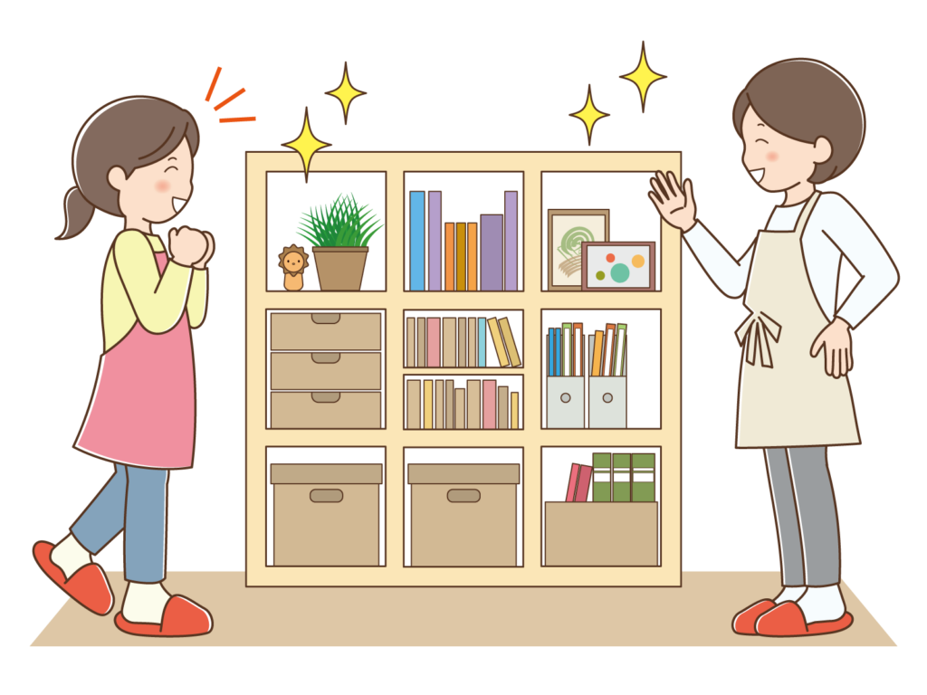引越し後で段ボール片づけてスッキリした女性と男性