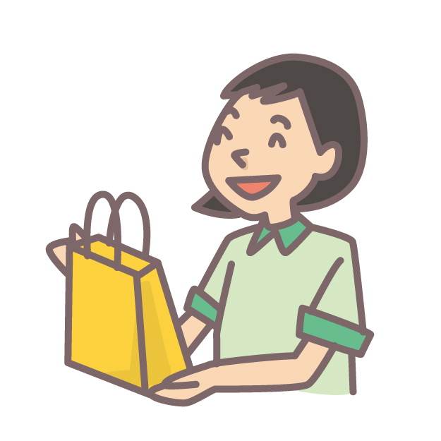 アニメグッズの入った紙袋を渡す女性